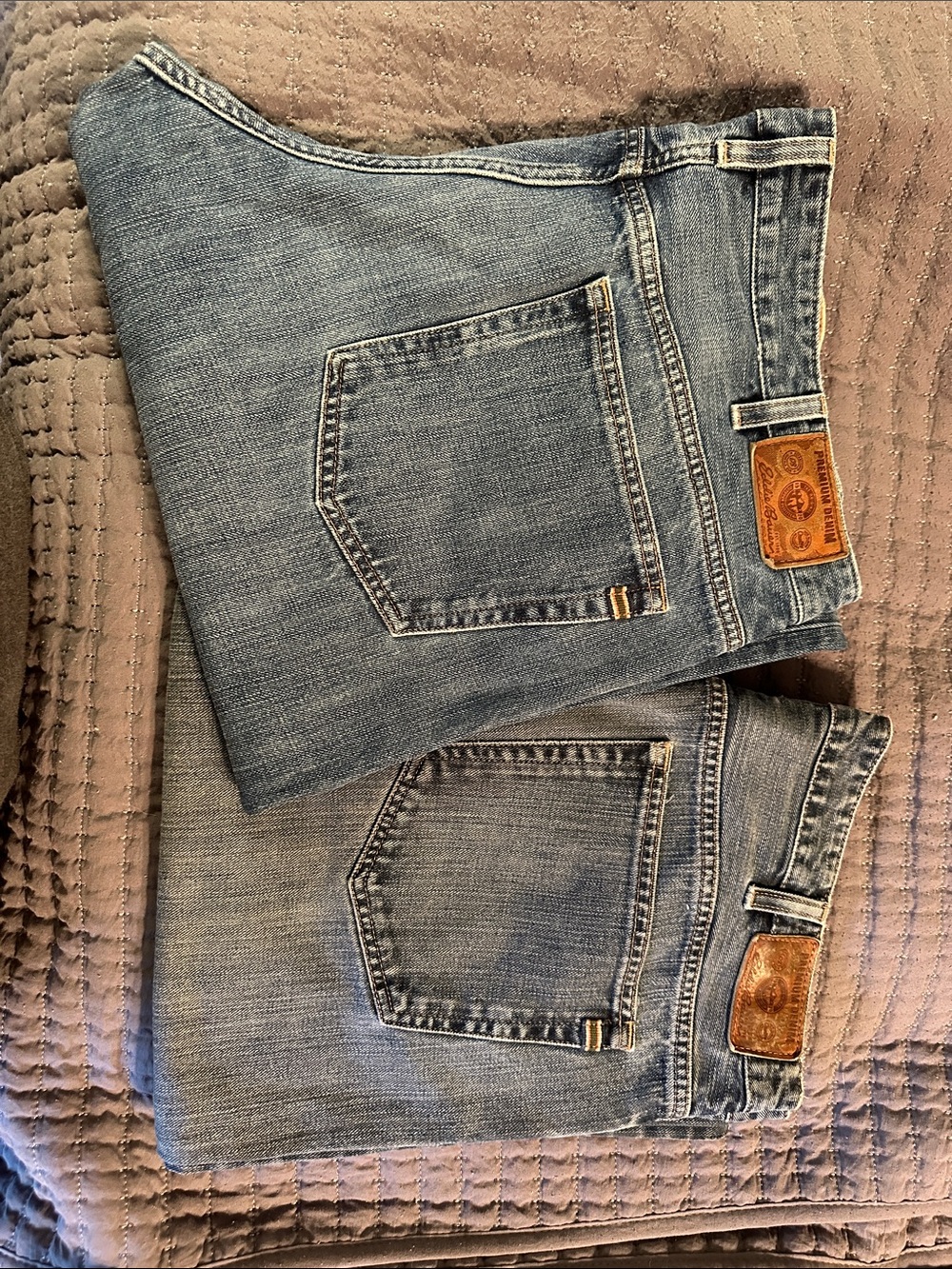 Pair of Eddie Bauer Men’s Bootcut Fit Jeans, Blue and Indigo colors. 38x32